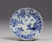 China - set of six white and blue porcelain saucers, Kangxi period.