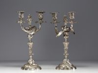 A pair of Louis XV silver-plated bronze candlesticks.