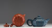 China - Set of two Yixing clay teapots.