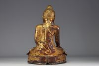 Asie - Bouddha en bronze doré en position de la prise de la terre à témoin, époque XIXème.