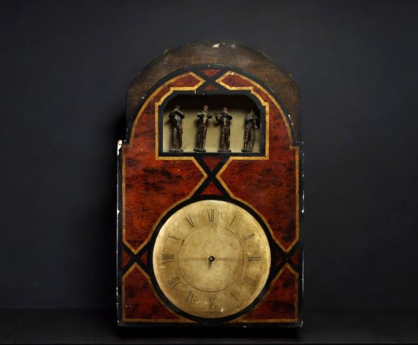 Horloge à orgue à quatre musiciens, cadran peint, chiffres romains, début du XIXème.