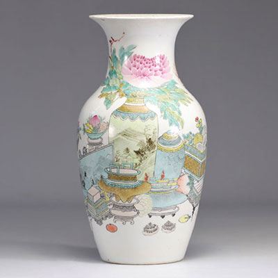 Famille Rose porcelain vase decorated with furniture objects