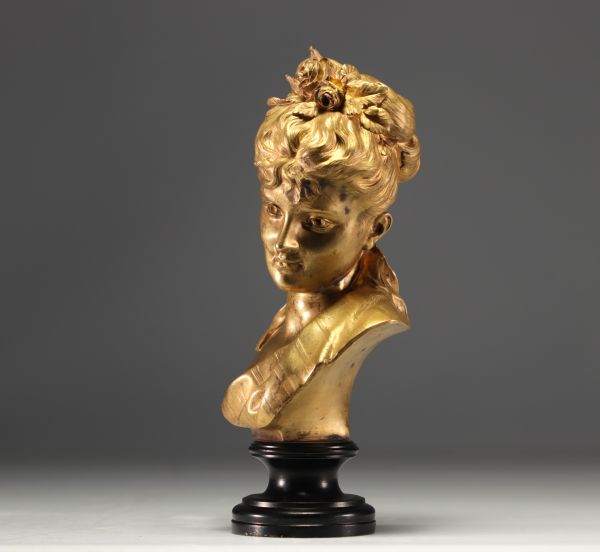 Bust of a young girl in bronze with gilded patina, published by the 