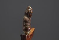 Malaysia/Indonesia - Kriss (Keris) handle in the form of a carved wooden divinity, wooden scabbard, 19th century.