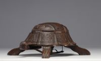 Wooden billiard spittoon in the shape of a turtle, late 19th century.