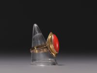Ring in 18K yellow gold and red coral, total weight 5.5gr.