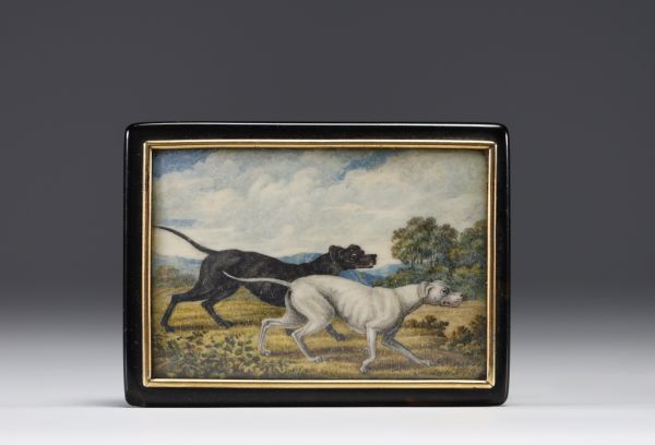 Rare tortoiseshell snuffbox with miniature hunting dogs and gold surround.