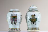 China - Pair of pink family polychrome porcelain vases with antique furniture decoration, 19th century.