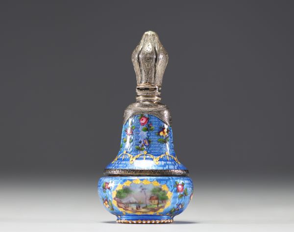 A rare silver and guilloché enamel salt flask decorated with flowers and landscape scenes, 19th century.