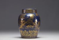 A pair of powder blue porcelain covered vases, decorated with roosters and flowers in gold, Qing dynasty, 19th century.