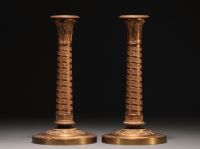 Pair of Empire bronze candlesticks, early 19th century.