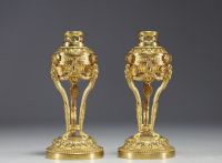 Pair of gilded bronze perfume burners convertible into candlesticks, Louis XVI period.