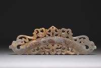 China - Pendant in gray/green jade, decorated with phoenixes and dragons.