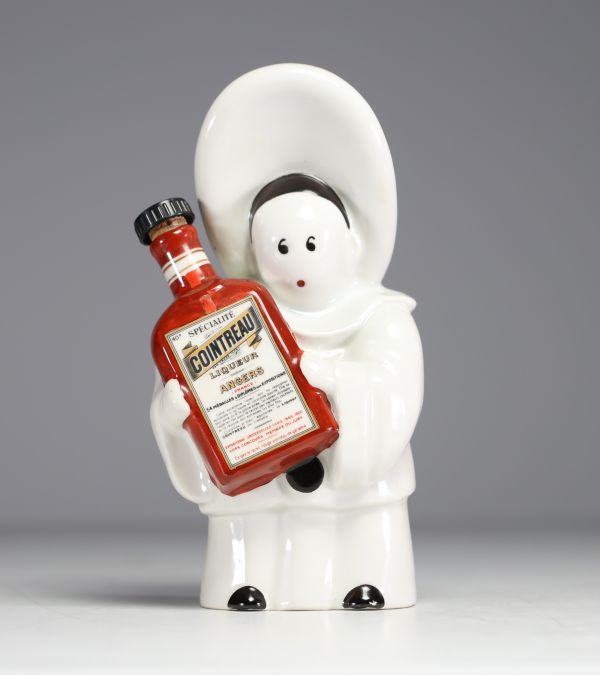 Pierrot publicitaire en porcelaine d'après Jean Adrien MERCIER pour Cointreau Liqueur à Angers.