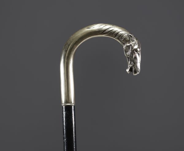 Alpacca cane with horse head motif.