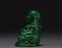 China - Buddha in green monochrome porcelain.