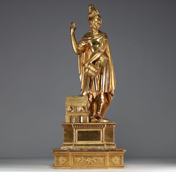 ‘Saint Florian' Gilded stuccoed wood sculpture on a base, 18th century.