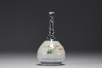 Japan - Sake bottle in porcelain with floral decoration.
