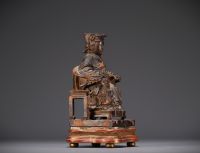 China - Statuette of a Dignitary in carved wood, Ming period.