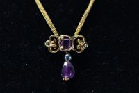 Christian LACROIX - Necklace, violet stone drop and gilded metal pearl, signed.