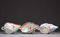 China - Set of three porcelain sauce boats, one blue white and two famille rose, 18th century.