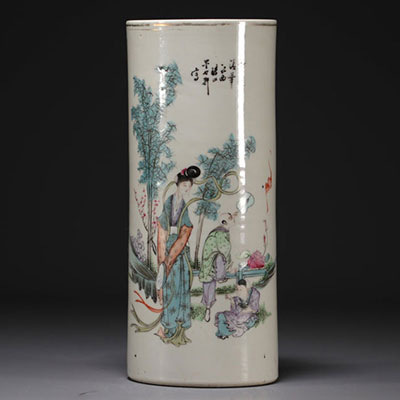 China - Famille rose porcelain brush-holder decorated with figures.