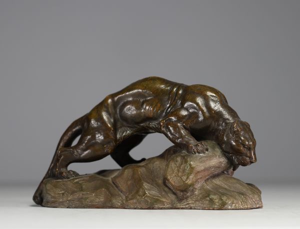 Armand FAGOTTO (19th-20th century) ‘Lionne s'abreuvant’ Sculpture in patinated terracotta, 19th-20th century, signed.