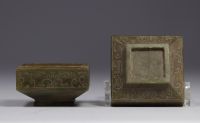 China - covered box in carved jade with archaic decoration.