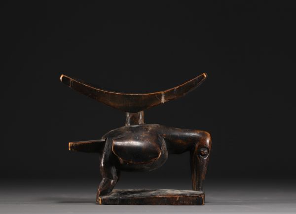 Afrique - Appuie nuque sculpté en forme d'oiseau.