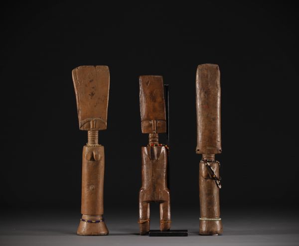 Ghana - Set of three carved wooden Fanti dolls.