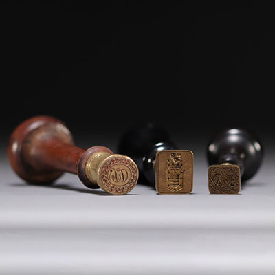 Set of three monogrammed wax seals.