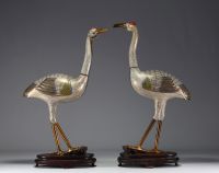 China - Large pair of cranes in cloisonné enamel on a wooden base, 19th century.