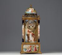 VIENNA - Imposing architectural clock in the form of a temple surmounted by a dome, polychrome porcelain with antique-style figures, bronze mounting.