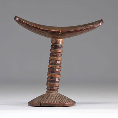 Finely carved neck rest from Africa