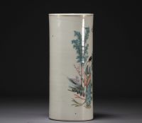 China - Famille rose porcelain brush-holder decorated with figures.