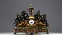 Imposing ormolu and patinated mantel clock decorated with antique figures, marble base, 19th century.