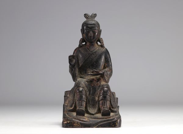 Bronze statue of a traditional figure with dark patinas and traces of gilding from Ming period China (明朝)