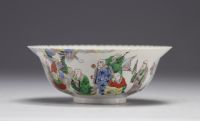 China - Porcelain bowl decorated with frieze of characters, mark in red under the piece.