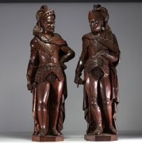 ‘The Conquistadores’ Imposing pair of carved oak statues, probably Spain, 19th century.