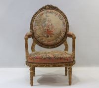 Important ensemble de mobilier de salon en bois sculpté et doré, tapisserie fine d'Aubusson comprenant un canapé et une suite de quatre fauteuils bergères, XIXème.