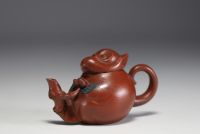 China - Yixing clay teapot in the shape of a monkey, debossed mark on the underside.
