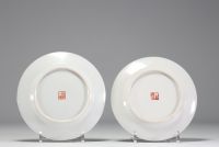 China - A pair of Famille rose porcelain plates decorated with figures.