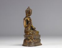 Gilded bronze Buddha probably from the Ming period - with a mark on the back