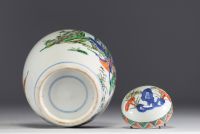 China - Covered ginger pot in green family polychrome porcelain with figures.