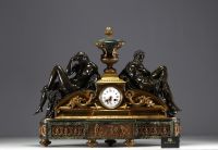 Imposing ormolu and patinated mantel clock decorated with antique figures, marble base, 19th century.