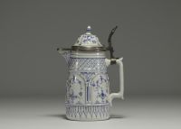 Rauenstein porcelain jug with white and blue decoration, pewter frame, 19th century.