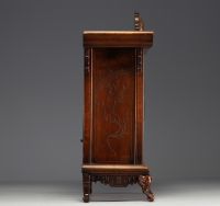 Carved exotic wood clock in the style of Gabriel Viardot with chinoisant decoration, elephant head feet, 19th century.