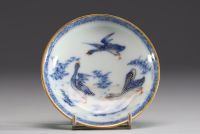 Chine - Ensemble de quatre bols et assiettes en porcelaine polychrome à décor floral et canards.18eme