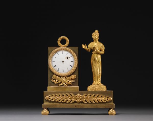 Petite pendule en bronze ciselé et doré d'époque Empire, mouvement Breguet, début XIXème.