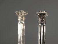 A pair of solid silver candlesticks with column decoration, hallmarked Tournai, Belgium, 18th century.